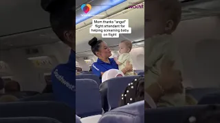 Flight attendant helps screaming baby on flight #shorts