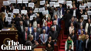 French MPs sing Marseillaise and boo as PM forces through pension reform bill