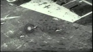 US Army men attack Japanese ground installations, ships and aircraft in Truk. HD Stock Footage