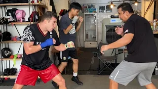 Boxing Coach Teaches How to Strike While Moving Backwards