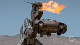 This Fire-Breathing Robot Dinosaur Absolutely Eradicates Cars | CarBoom!