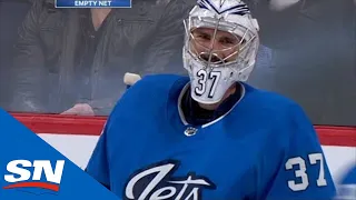 Connor Hellebuyck Goes For Goalie Goal, Bo Horvat Swats It Down