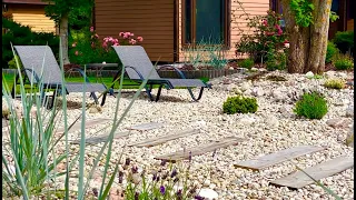 I am creating a flowerbed in a Mediterranean style. Rockery made of pebbles. Landscape design