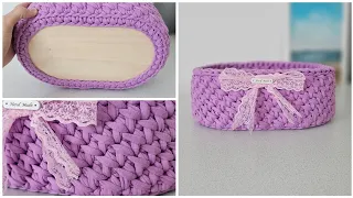 The densest crochet pattern for large baskets. Oval basket made of knitted yarn.
