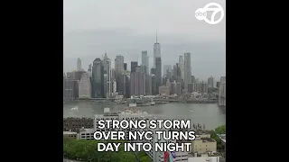 Strong storm over NYC turns day into night