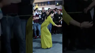 Dancing keeps you young and attractive.  Tibetan girl Tibetan dress show Chunxi Road stree