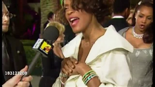 (1999)  MTV reporter interviews High Whitney Houston