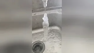 Water running out of tap freezes solid in midair in northeastern China