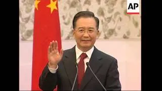 German chancellor meets Chinese premier, comments