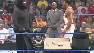 Batista and Mark Henry sign the contract for the Great American Bash   07 14 06   world's strongest man wwe wrestling batista smackdown Pictures, Batista and Mark Henry