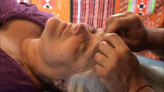 Face massage and scalp massage. Naturopath Brandon Raynor massaging Mary's face part 1