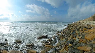 Sea on a rocky beach in spring - VR