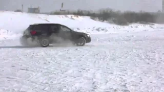 Subaru Outback, Forester, Nissan X-trail snow drift on lake