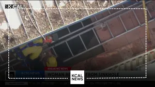 Woman rescued from sinkhole in Fontana