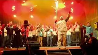 Daniel Igali Lights the Olympic Cauldron