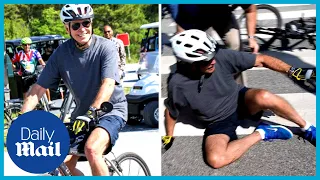 Moment Biden FALLS OFF his bike: 'My foot got caught'