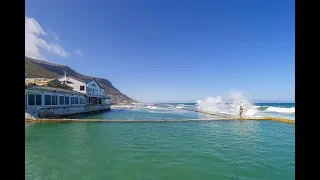 A tourist in Kalk Bay, Cape Town (Brass Bell for fish & chips)