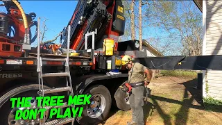 Devastating Tornado cleanup with a grapple saw truck in Amory Mississippi