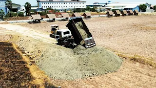 Opening new roads in the resorts under development by small Komatus D20P Bulldozer With Mini Trucks