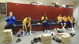 Coach xavi welcomes Aubameyang to Barcelona dressing room.