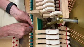 Regulating spoons on the vertical piano - even damper lift from the key