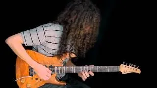 Larry Carlton style track by  Guthrie Govan
