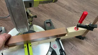 Cut multiple long pieces of wood to the exact same size using a mitre saw.