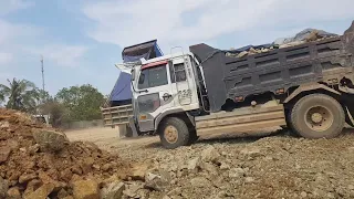 Bulldozer vs dump tricks are filling the rice field in action. #bulldozer #dumptruck #excavator