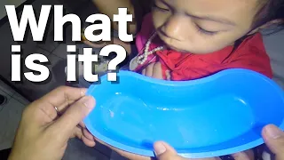 Removing Something Stuck From Little Girl's Ear | What is it?