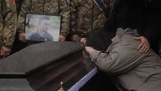 Mourners gather at Kyiv's Independence Square to pay tribute to medic killed in action