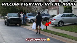 PILLOW FIGHTING STRANGERS IN PUBLIC | Hood Edition