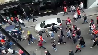 FC KOLN FANS MARCHING THROUGH SOHO. ARSENAL.