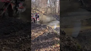 Ryan Piper and Van Adams battling through mud hole at Deer Ridge IXCR 2023