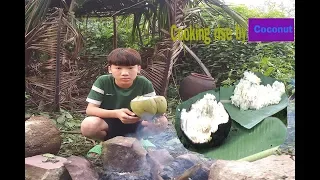 Primitive Technology   Cooking rise by Coconut for dinner