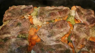 Pork neck with vegetables baked