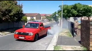 Dual beams powered Toyota  hilux doing a burnout!!