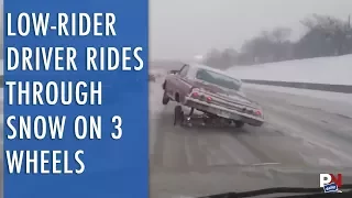 Watch This Low-Rider Driver Ride Through The Snow On 3 Wheels
