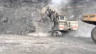 O & K RH200 Shovel Loading a 789 Caterpillar Trucks