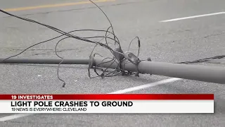 Cleveland light pole crashes to the ground