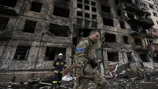 Watch: Aftermath of a deadly attack on a residential block in Kyiv