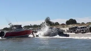 Retrieving a boat when the swell is pushing at Lancelin beach.