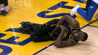 Draymond Green is down in serious pain after Hayward knees him right in the beans