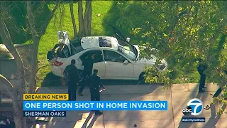 1 shot in arm, 1 grazed by gunfire in Sherman Oaks home invasion I ABC7