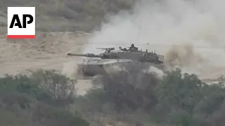 Watch military movement on Israel's border with Gaza as cease-fire efforts continue