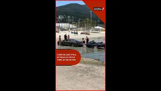 Carro de luxo atola em praia ao tentar tirar jet ski do mar em SC #shorts