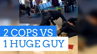 2 Cops vs. 1 HUGE Guy! (Gracie Breakdown)