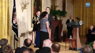 President Obama presents Rita Dove with the 2011 National Medal of Arts