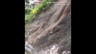 MOMENT: Landslide triggered by heavy rain sweeps away buildings in India's Himalayan region