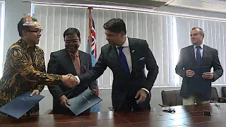 Fijian Attorney-General officiates at the signing of TOR with the Multinational Observer Groups
