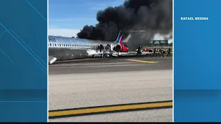 Watch: Plane skids off runway, catches fire in Miami